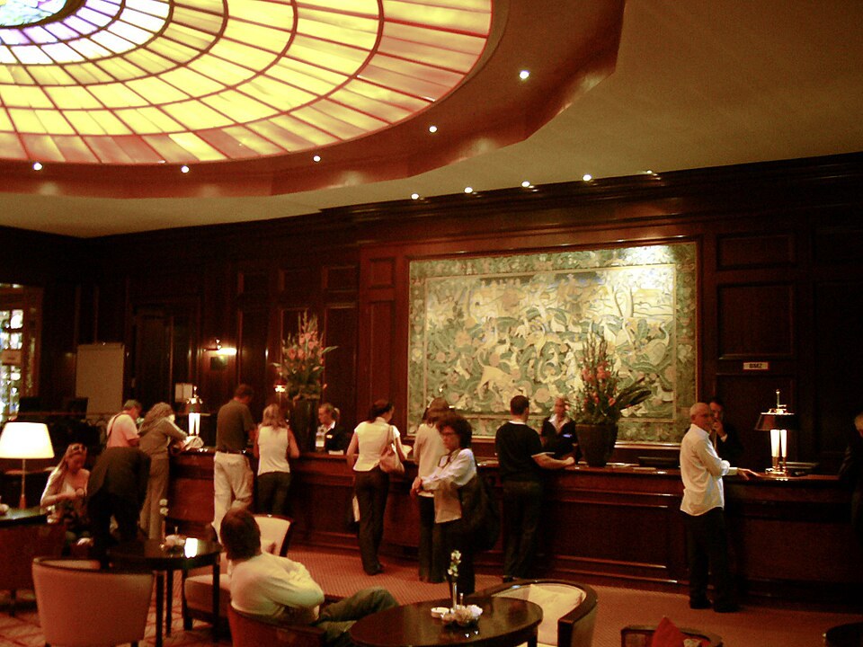 Guests at a hotel front desk